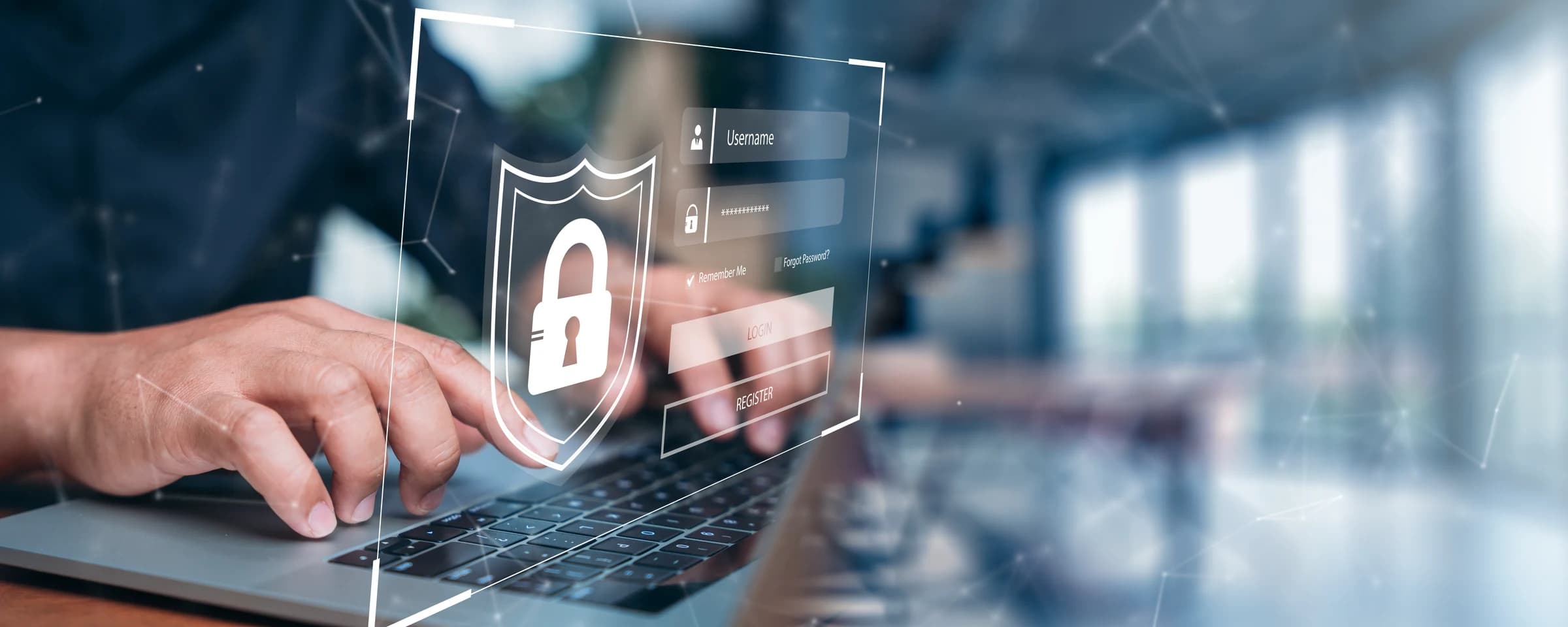 A person using a laptop with a digital cyber security lock interface